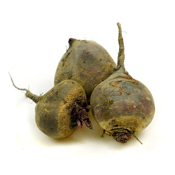 KI generiert: Das Bild zeigt eine Nahaufnahme von frischen Grünkohlblättern. Die krausen, grünen Blätter sind dicht beieinander angeordnet.