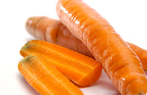 KI generiert: Das Bild zeigt eine Nahaufnahme von frischen Grünkohlblättern. Die krausen, grünen Blätter sind dicht beieinander angeordnet.