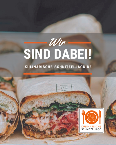 KI generiert: Ein Sandwich mit dem Text: "Wir sind dabei! kulinarische-schnitzeljagd.de".